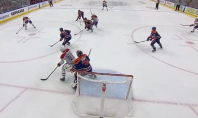 Canadiens forward Nick Suzuki scoring
